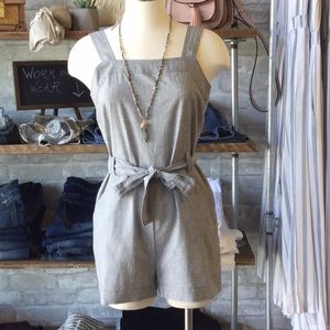 Adorable grey romper ties in front with bow